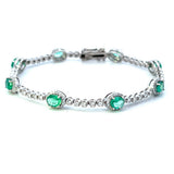 Z 92 - Brazalete Diamantes y Esmeraldas en Halo de Diamantes