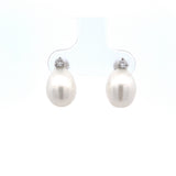 T 858 3257 - Aretes Perla Oval y Diamante Round