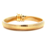 GS 528 - Brazalete Omega Ancho en Oro Amarillo